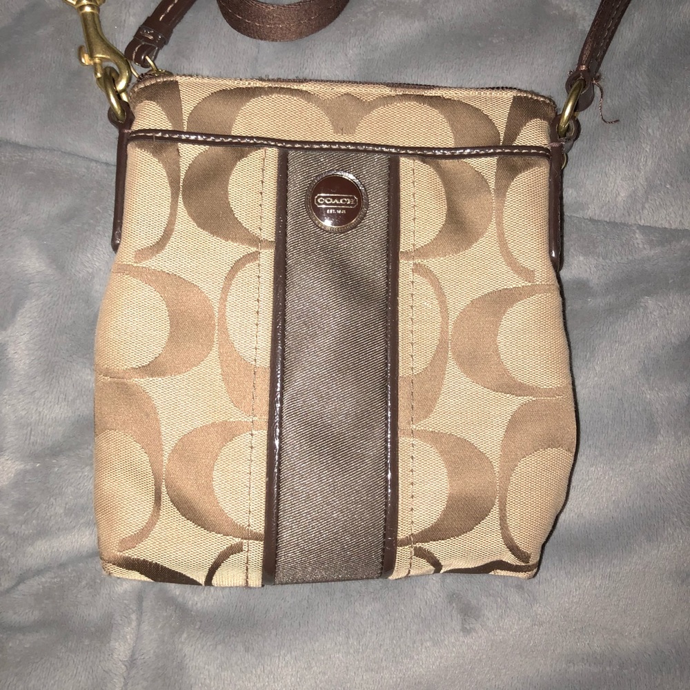 Authentic COACH signature brown and tan cross body